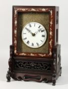 A 19TH CENTURY CHINESE MANTLE CLOCK, with fusee movement and mother-of-pearl inlaid rosewood case.