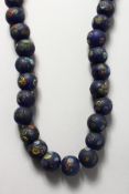 A VERY GOOD SET OF BLUE ROMAN BEADS.