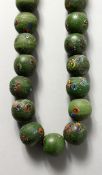A VERY GOOD SET OF GREEN ROMAN BEADS.