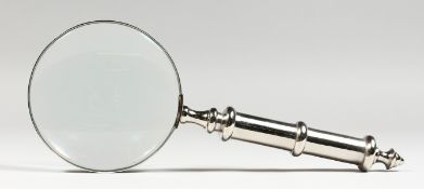 A MAGNIFYING GLASS.