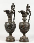 A GOOD LARGE PAIR OF BRONZE CLASSICAL STYLE EWERS. 23ins high.
