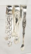 THREE PAIRS OF SILVER SUGAR TONGS.