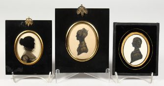 THREE FRAMED SILHOUETTES OF LADIES.