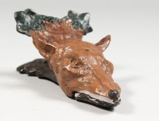 A SMALL VIENNA STYLE COLD PAINTED BRONZE FOX'S HEAD. 6ins long.