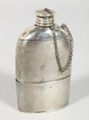 A WILLIAM IV ENGINE TURNED HIP FLASK, with crest, stopper and chain. London 1836. Maker: Jacob