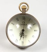 A BALL SHAPED DESK CLOCK.