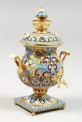 A MODERN RUSSIAN SILVER AND CHAMPLEVE ENAMEL MINIATURE SAMOVAR. 4ins high.