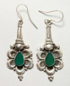 A PAIR OF SILVER AND GREEN ONYX EARRINGS.