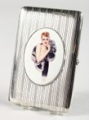 AN ENGINE TURNED SILVER CIGARETTE CASE, with an oval of a model with a fur coat.