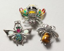 THREE SILVER AND ENAMEL BUG BROOCHES.