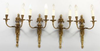 A SET OF FOUR ADAM REVIVAL ORMOLU TWIN-BRANCH WALL APPLIQUES, with urn finials. 16ins high.