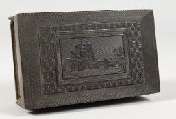 A SMALL CASED MUSICAL BOX. 4ins long.