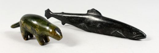AN INUIT CARVED HARDSTONE FIGURE OF A FISH. 
