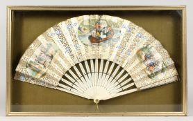 A GOOD FRENCH IVORY AND PAPER FAN in a glass case.