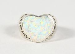 A SILVER AND OPAL RING.