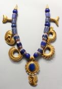 A VERY GOOD SET OF SILVER GILT AND BLUE ROMAN BEADS.