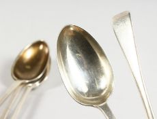FIVE GEORGIAN EXETER DESSERT SPOONS.