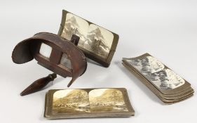 A STEREO VIEWER with topographical cards.