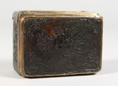 A 19TH CENTURY TORTOISESHELL BOX AND COVER, with musical trophies. 3ins long.