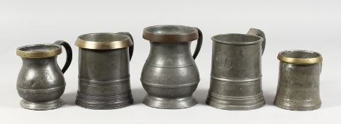 FIVE VARIOUS PEWTER TANKARDS.