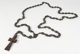 A SET OF ROSARY BEADS.