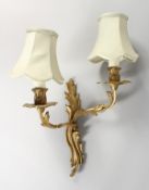 A ROCOCO STYLE ORMOLU TWIN-BRANCH WALL APPLIQUE, of naturalistic form. 15ins high.