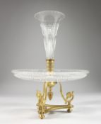 A GOOD CUT GLASS AND ORMOLU CENTREPIECE, with trumpet shaped flower holder, circular dish on an