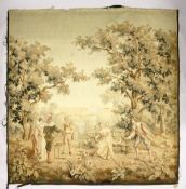 A BRUSSELS STYLE TAPESTRY WALL HANGING, depicting figures in a parkland setting (AF). 8ft 4ins