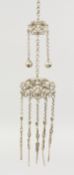 A CHINESE PIERCED SILVER CHATELAINE.