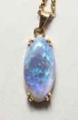 A 14CT GOLD OPAL SET PENDANT on chain.