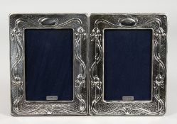 A PAIR OF ART NOUVEAU STYLE PHOTOGRAPH FRAMES. 7.25ins x 5.5ins.