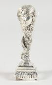 A WHITE METAL ART NOUVEAU STYLE DESK SEAL.