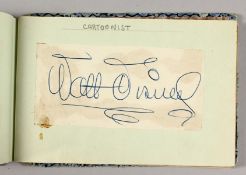 A 1952 AUTOGRAPH ALBUM, including Walt Disney, Fred Winter, Bing Crosby, Denis Compton, Clark