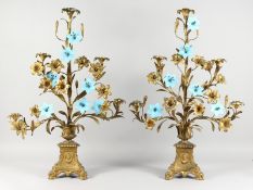 A PAIR OF 19TH CENTURY ORMOLU CANDELABRA, of naturalistic form, with leaves and flowers, the stems