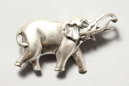 A SILVER ELEPHANT SHAPE BROOCH.