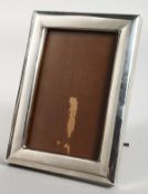 A PLAIN PHOTOGRAPH FRAME. 6.5ins x 4.5ins.