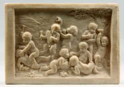 AFTER CLODION A SMALL MARBLE PLAQUE OF PUTTI AT PLAY. 7ins x 5ins.