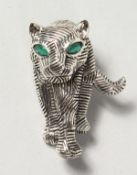 A SILVER DECO STYLE TIGER BROOCH.
