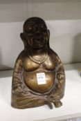 A bronze seated Buddha.
