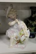 A figural posy holder.