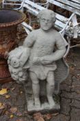 A good weathered garden figure, possibly sandstone, modelled as a man holding a bunch of flowers.