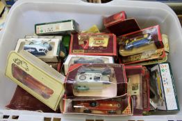 A large quantity of boxed collector's model cars etc.