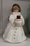A Goebel porcelain candle holder modelled as an angel.