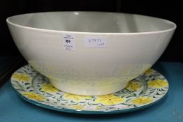 A Doulton George VI white pottery bowl and a hand painted plate.