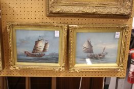 Chinese Junks at Sea watercolours, in decorative gilt frames, a pair.