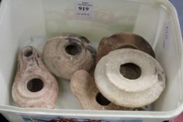 Five Roman oil lamps.