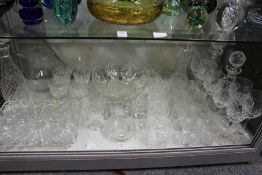 A quantity of glassware to include decanters, drinking glasses, bowls and trays.