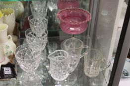 A cranberry colour and clear glass pedestal bowl and other cut glassware.