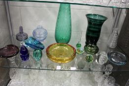 A good collection of colourful art glass items to include vases, bowls, paperweights etc.