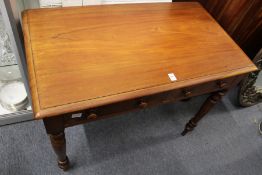 A Victorian mahogany two drawer side table.